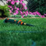 Garden sprinkler watering lawn